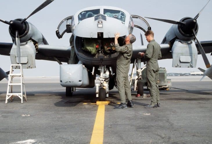 Pre-flight inspection of OV-1D Mohawk