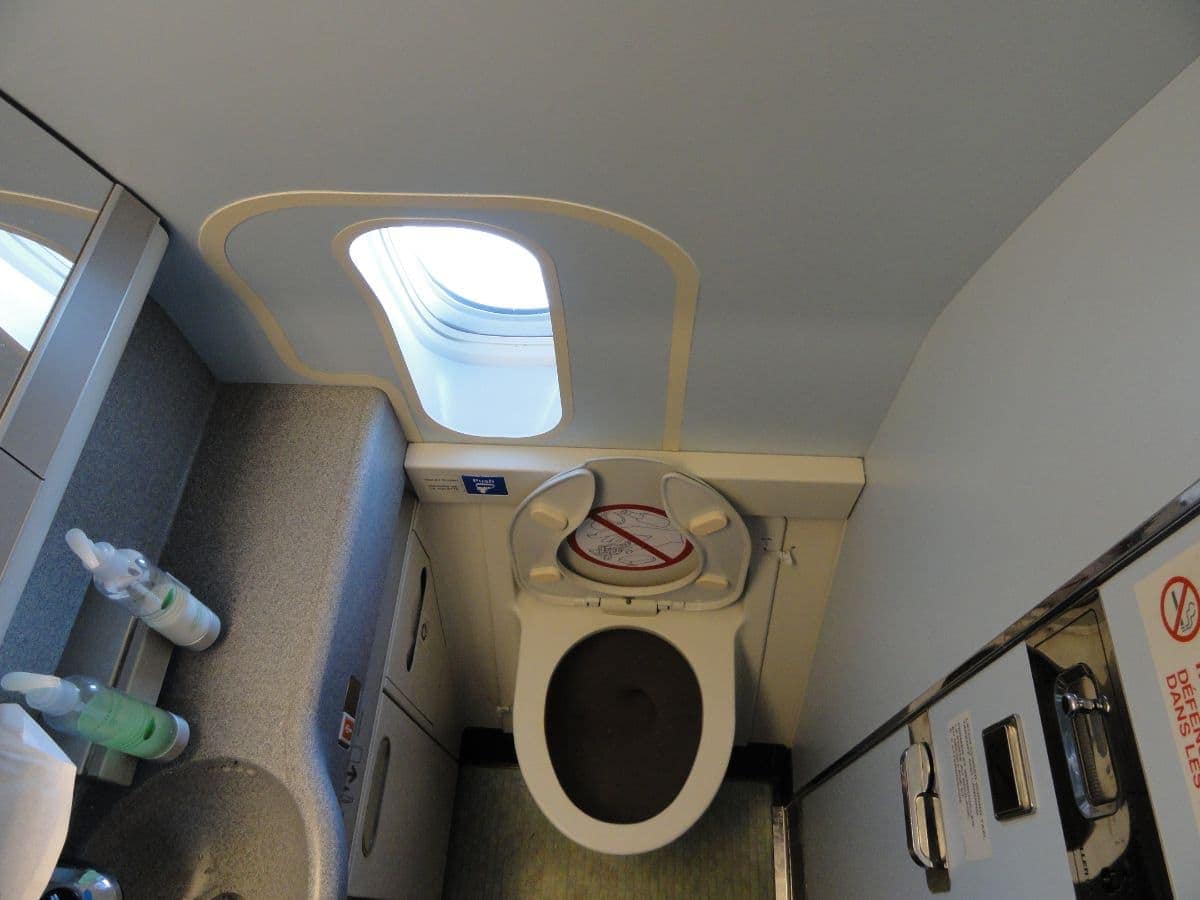 How Airplane Toilets Work (Releasing Waste Mid-Air?!) · AeroCorner
