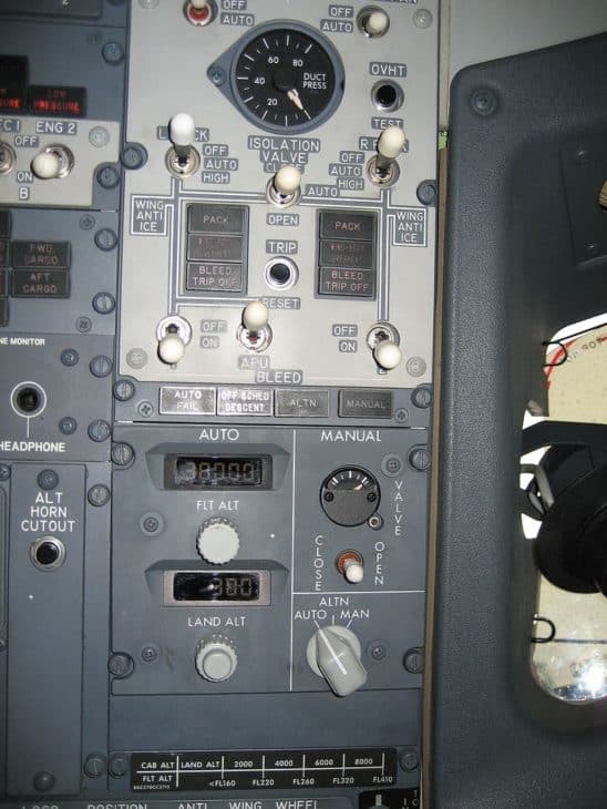 Cabin Pressure and Bleed Air Control Panels on a Boeing 737-800