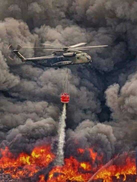 Helicopter Fighting Forest Fires