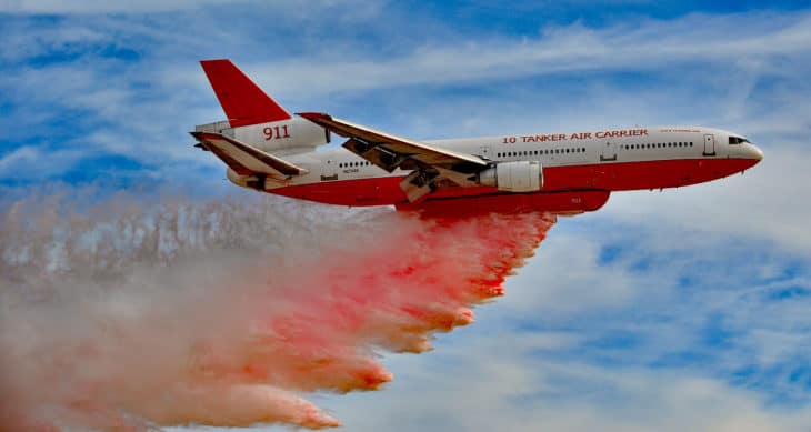 McDonnell Douglas DC 10 30 Air Tanker dumping its load in Las Vegas during Aviation Nation 2016 Air Show