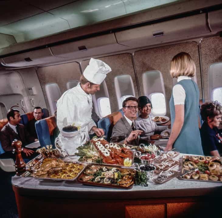 First Class Dinner being served on board SAS Huge Viking Boeing 747