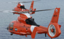Two coast guard HH 65C Dolphin helicopters