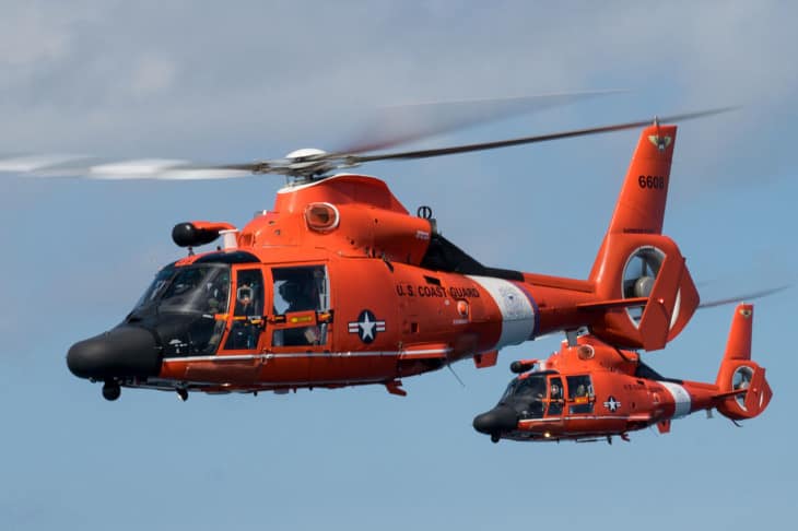 USCG MH 65 Dolphin formation flight over