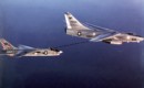 U.S. Navy Douglas EKA 3B Skywarrior refuels a Vought F 8J Crusader.