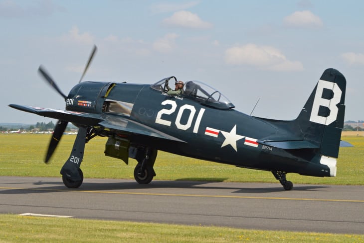 Grumman F8F-2P Bearcat B-201 taxiing on a runway