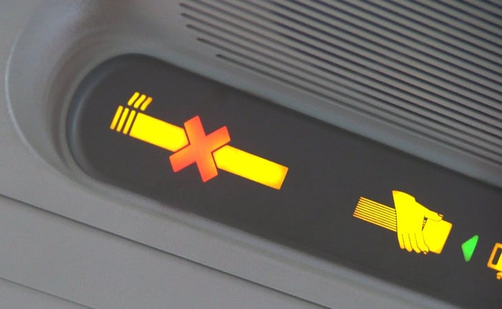 No smoking sign on airplane