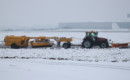 Snow clearing tractor in action at Cardiff Airport