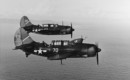 Two Curtiss SB2C 1C Helldiver dive bombers in flight.1944