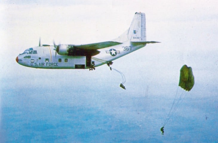 South Vietnamese paratroopers jump out of a U.S. Air Force Fairchild C 123B Provider.
