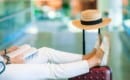 Airline passenger in an airport lounge waiting for flight