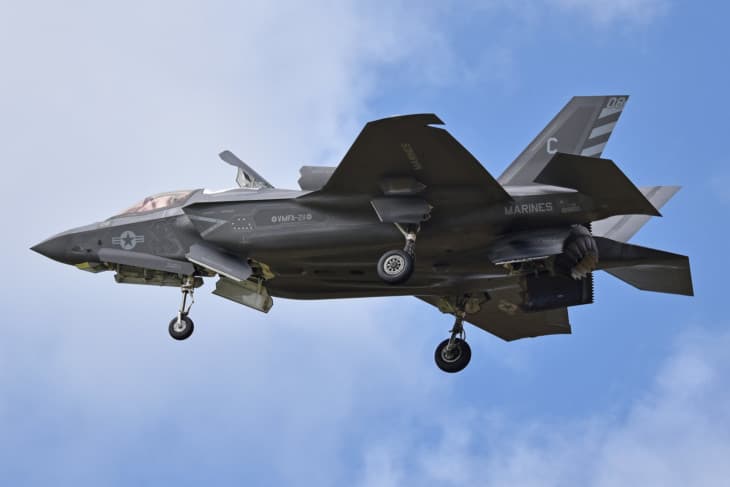 US Marine Corps F-35B Lightning II hovering with its lift-fan doors open and rear nozzle pointed down