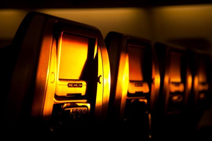 Airplane chairs lighted by sunset