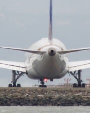 Why Are Airplane Engines Positioned Under the Wing?
