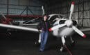 young woman with private airplane