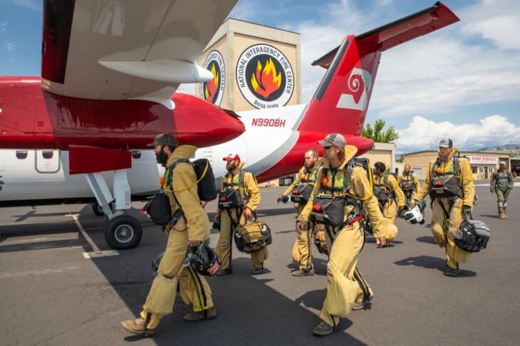 bureau of land mangement smokejumpers prepare for a training jump