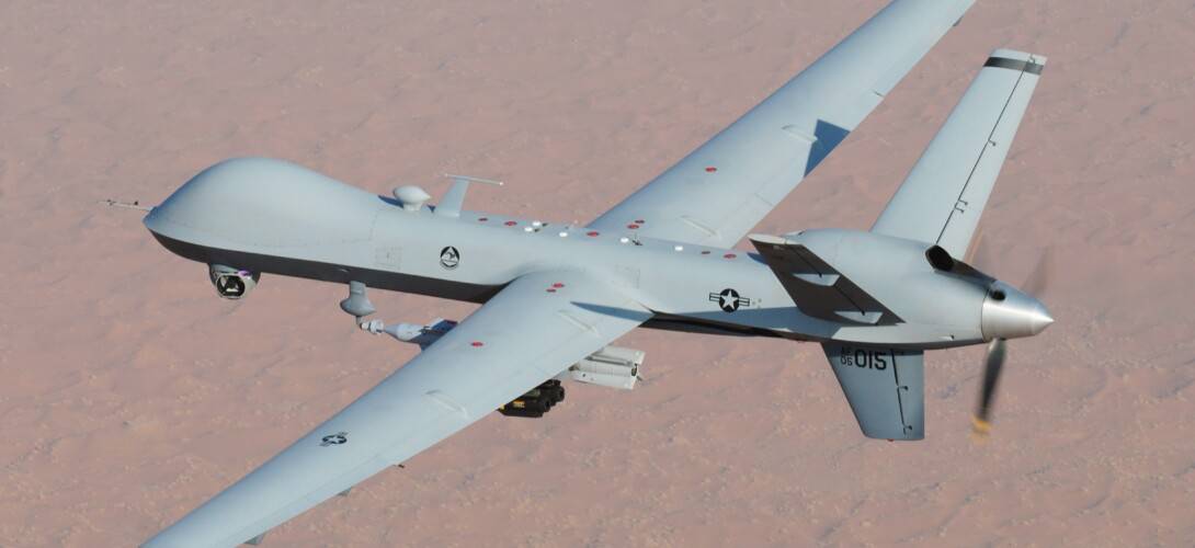 An MQ-9 Reaper unmanned aerial vehicle flies a combat mission over southern Afghanistan
