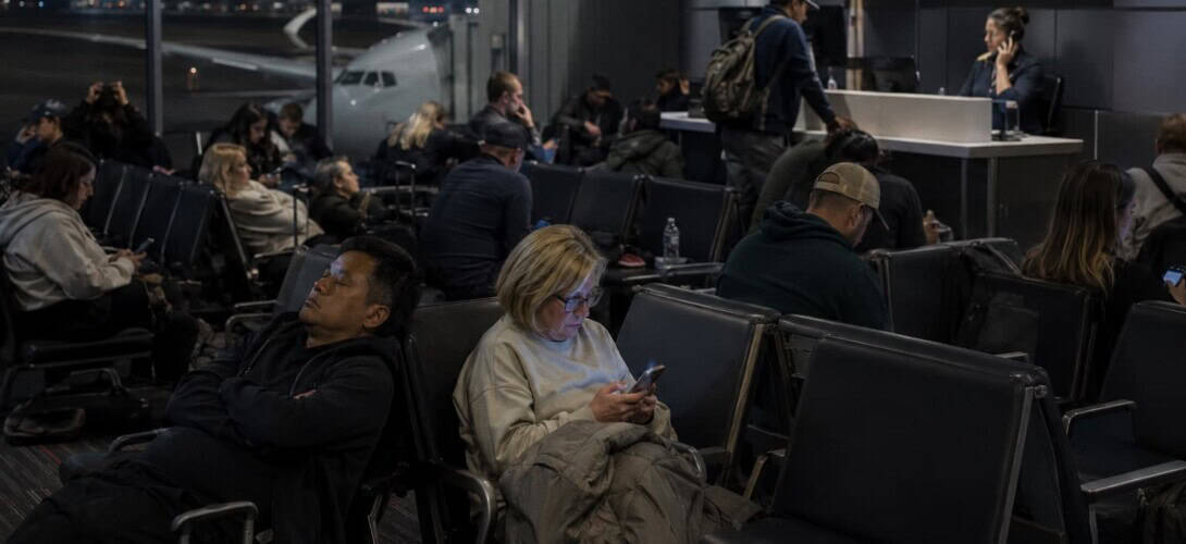 Passengers waiting at gate during long delay
