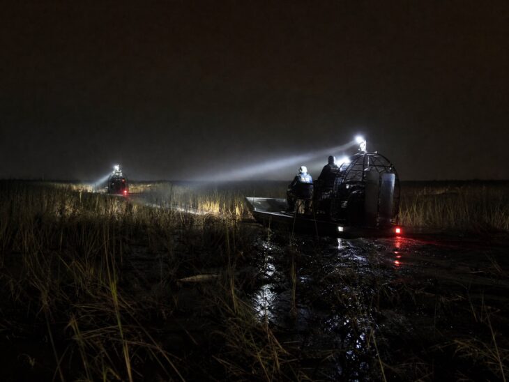 Emergency rescue airboats searching the Florida Everglades at night following the Eastern Airlines Flight 401 crash