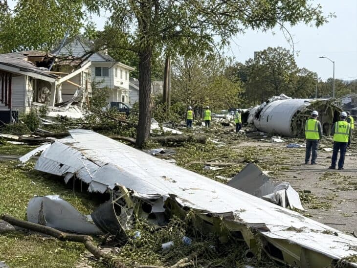 Aircraft wreckage scattered across a suburban neighborhood following the United Airlines Flight 173 crash near Portland