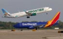 Frontier A321 lifts off 6R as a Southwest 737 taxies out