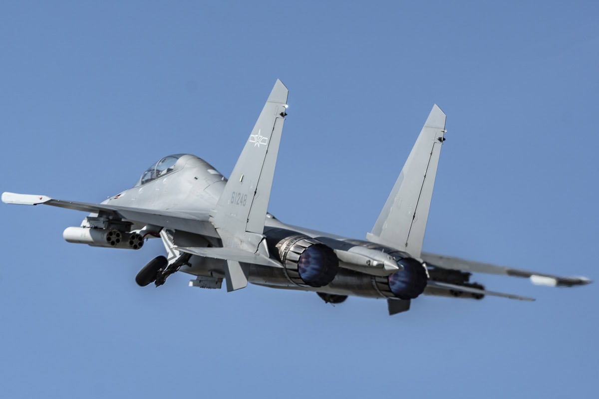 Shenyang J-16 strike fighter taking off, showing its twin WS-10 engine nozzles