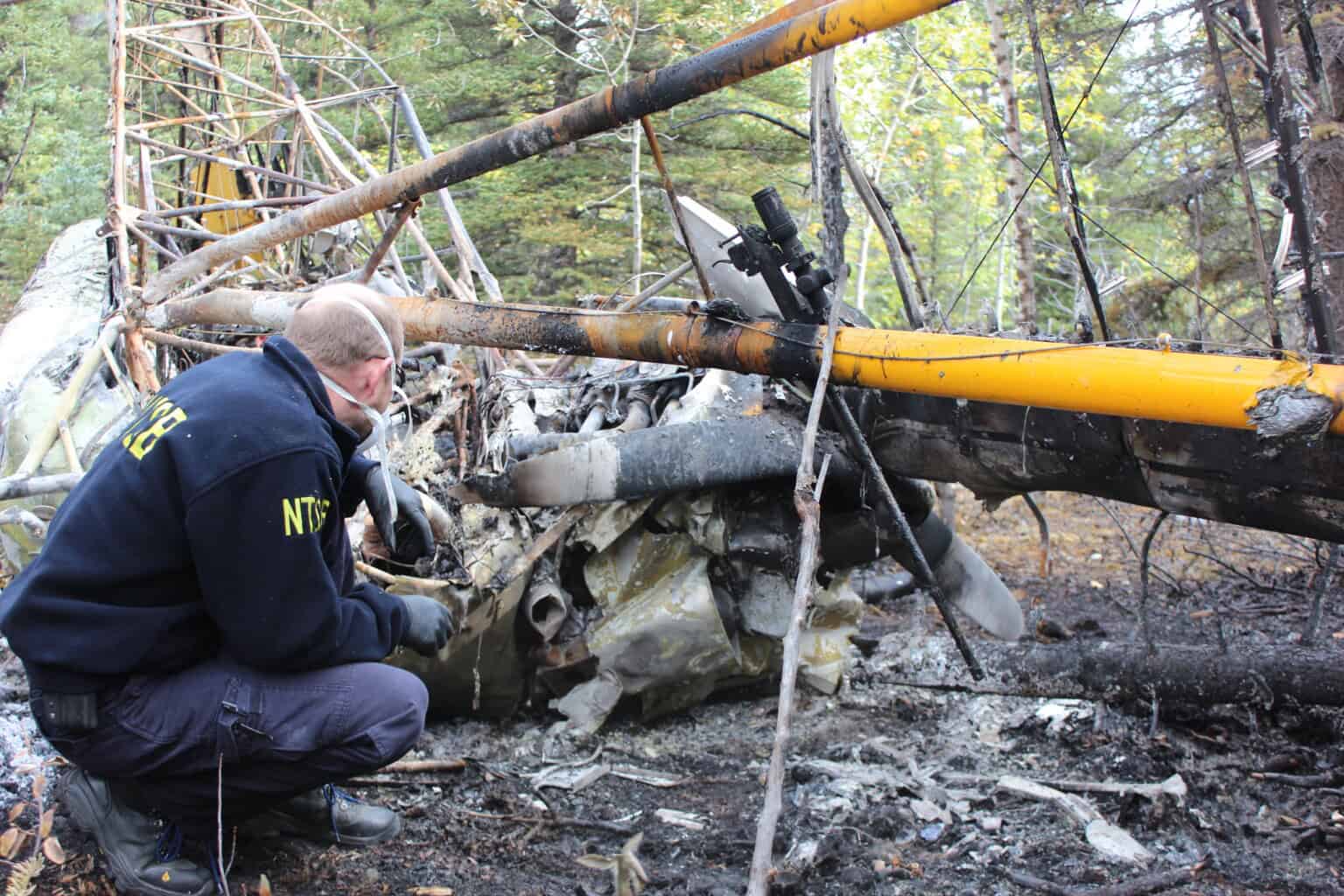 NTSB Investigator assesses the scene of a Piper PA 18 Super Cub crash near McGrath, Alaska