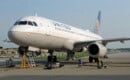 United A320 having work done on the nose gear