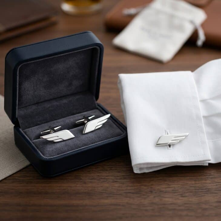 Wing-shaped cufflinks are formal enough for a wedding and personal enough to mean something.