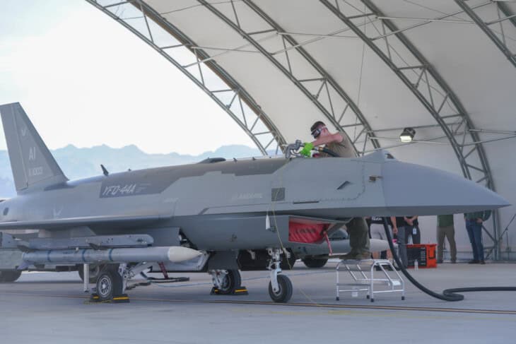 an airman refuels a YFQ 44A Fury aircraft