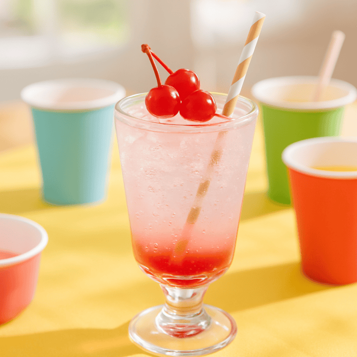 Pouring grenadine last gives a Shirley Temple its sunset gradient.