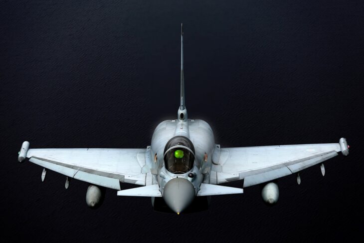 Royal Air Force Typhoon FGR4 seen head on in flight above dark water