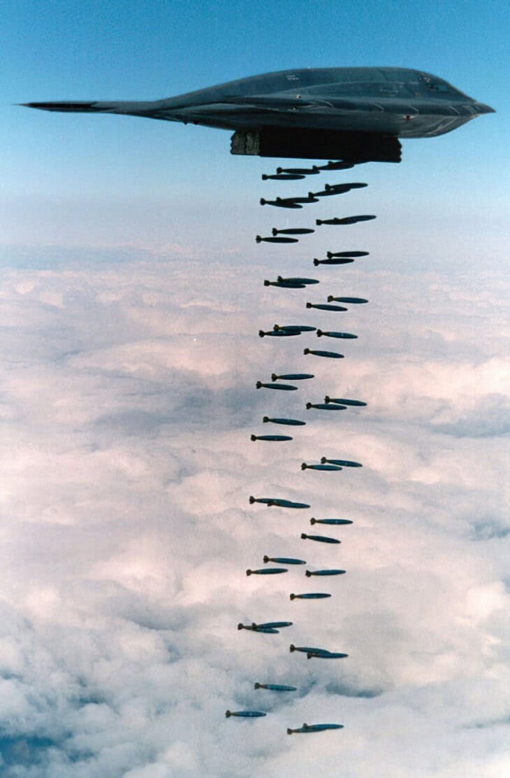 A B-2 Spirit dropping Mk.82 bombs into the Pacific Ocean in a 1994 training exercise