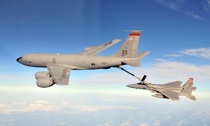 KC-135R Stratotanker refueling an F-15C Eagle by boom in flight