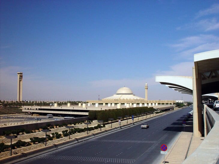 King Khalid International Airport in Riyadh with its control tower and the airport mosque beyond the terminal approach road
