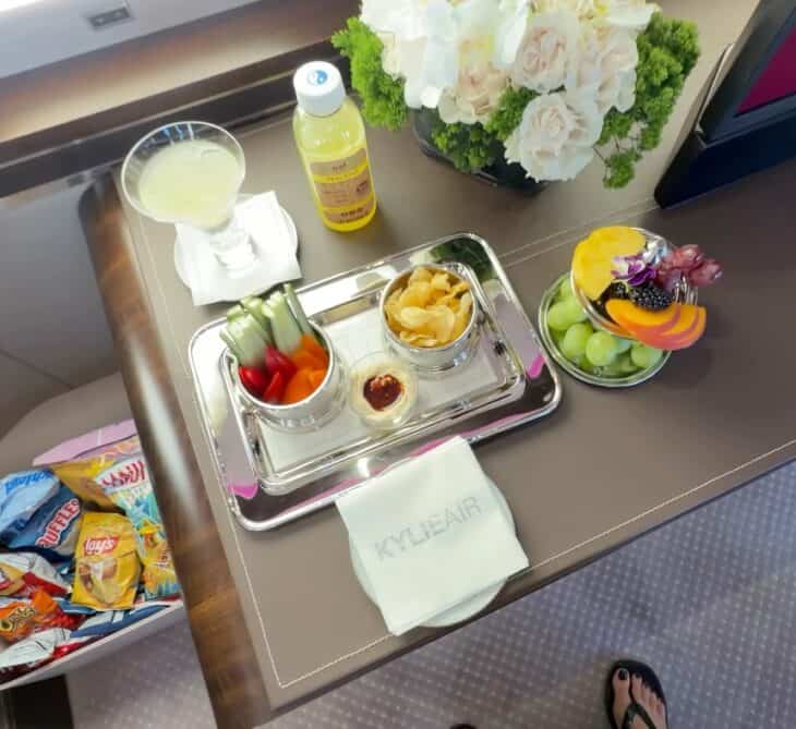 Kylie Jenner Private Jet snacks and personalized napkins