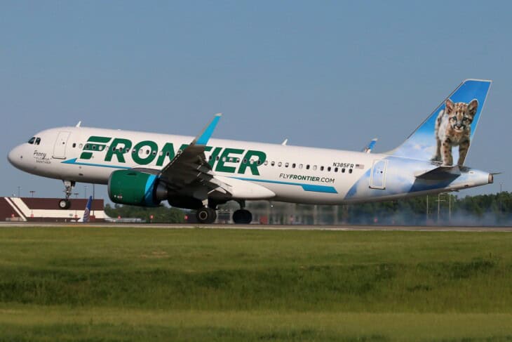 Frontier Airlines Airbus A320neo N385FR touching down on the runway