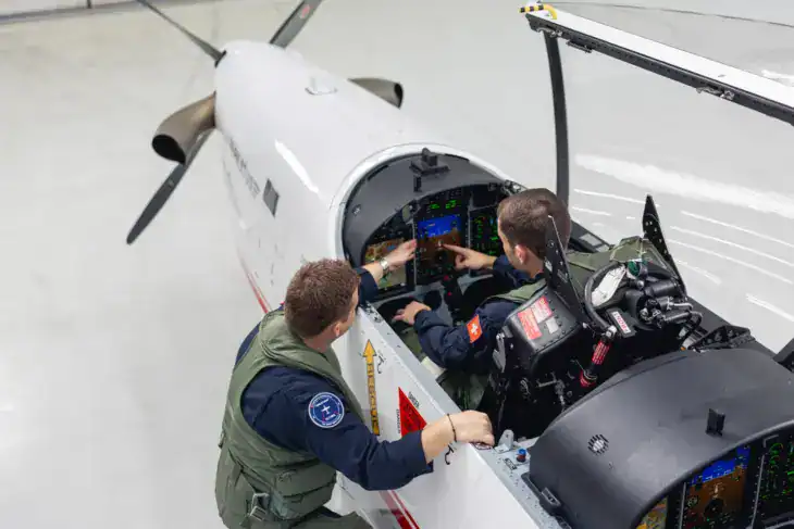 PC-7 MKX with student pilots