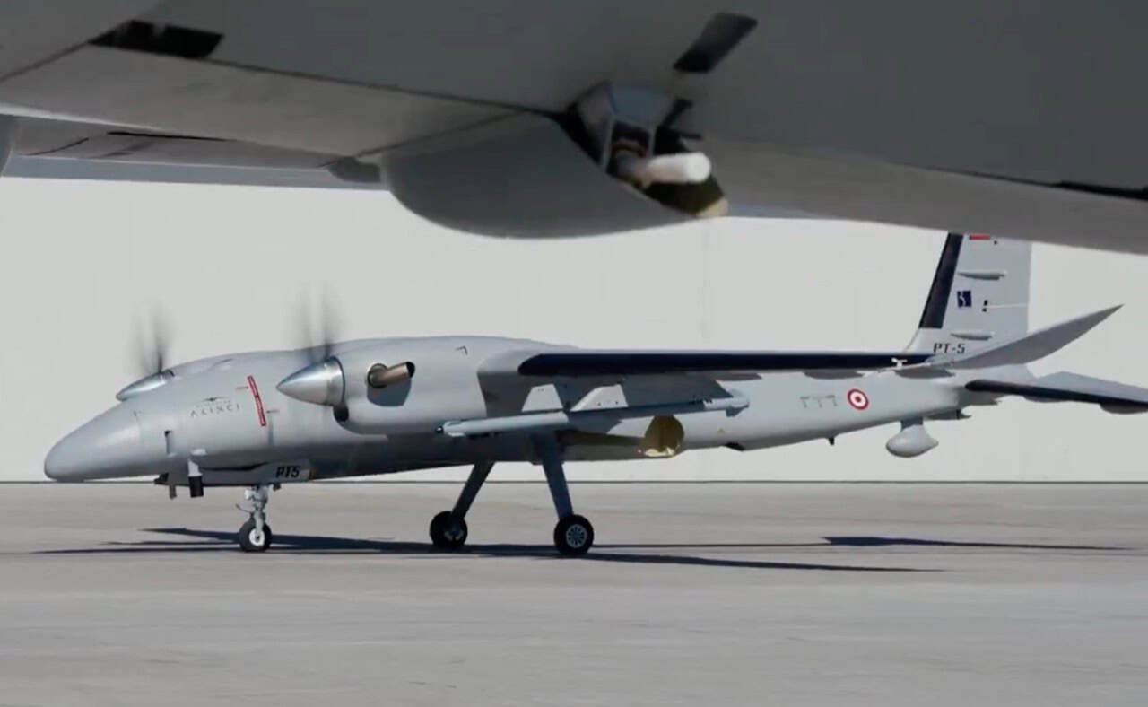 Turkish Bayraktar Akinci unmanned combat aircraft firing a UAV-300 air-launched ballistic missile over the Black Sea 3