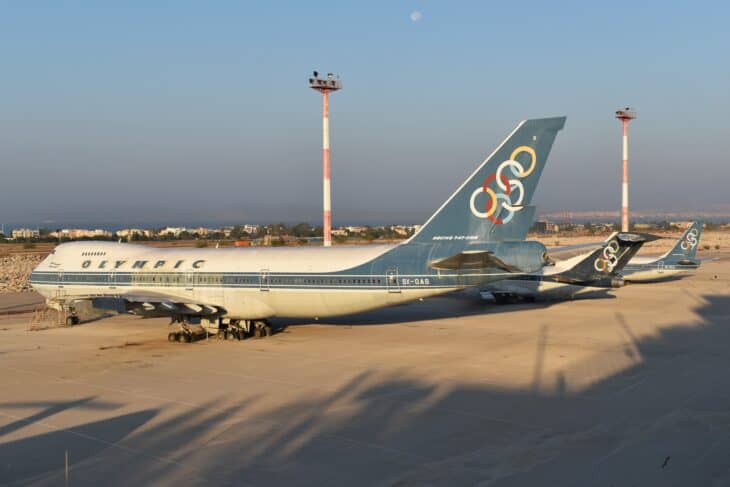 Derelict Olympic Airways Boeing 747, 727 and 737 parked on the concrete at Ellinikon