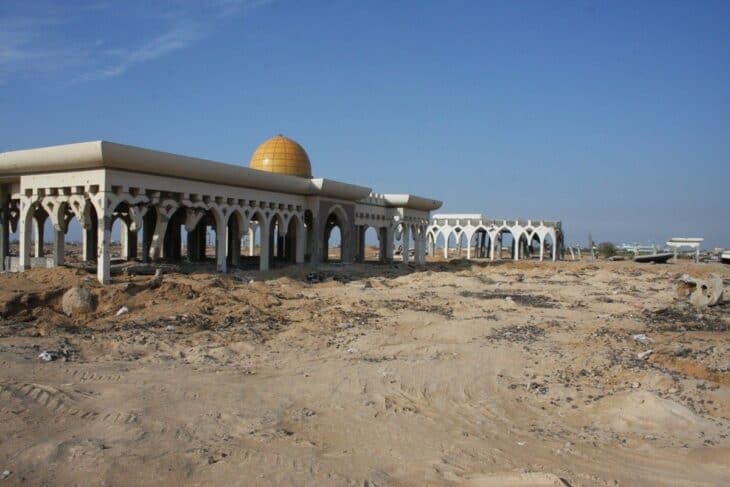 The derelict domed terminal of Gaza International Airport surrounded by bare earth in 2008