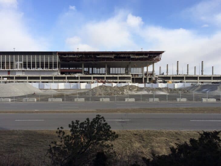 Mirabel airport's passenger terminal partly demolished, with rubble in front