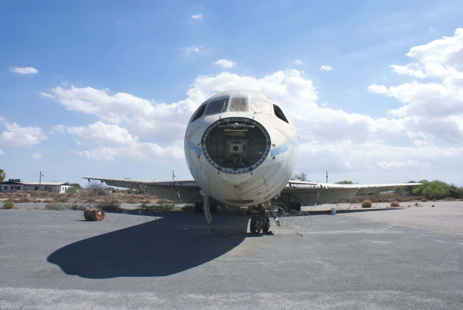 The stripped nose of a derelict Cyprus Airways Hawker Siddeley Trident on the apron at abandoned Nicosia International Airport