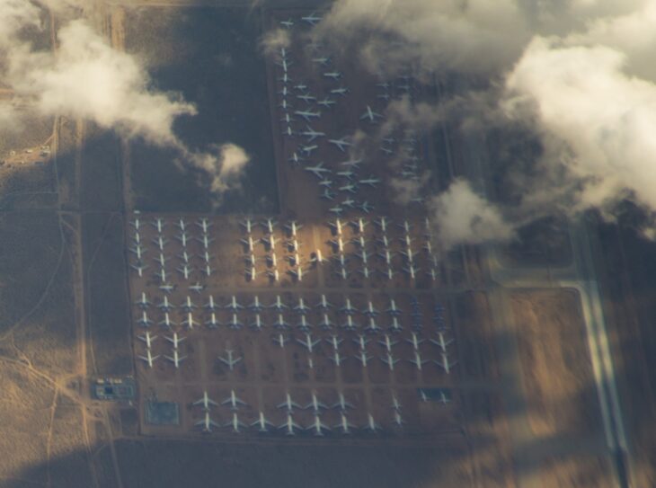 Aerial view of rows of parked airliners on the storage ramps at Southern California Logistics Airport in Victorville