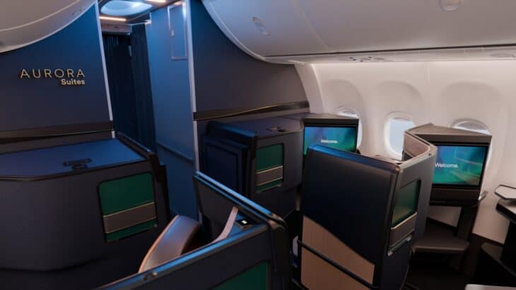 Rendering of the Aurora Suites cabin entrance on an Alaska Airlines 737-10, with suite privacy shells and welcome screens