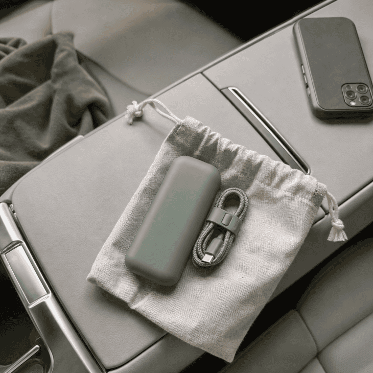 A fully charged power bank rescues a traveler whose phone died somewhere over the clouds.