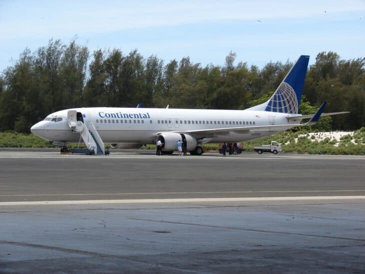 Continental Airlines Boeing 737-800 N25201 parked with airstairs on the ramp at Henderson Field, Midway Atoll