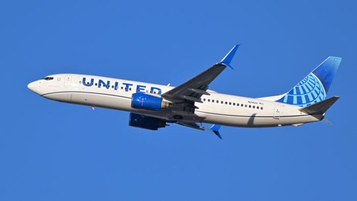 United Airlines Boeing 737-800 N24211 in the current blue and white livery climbing out of Boston