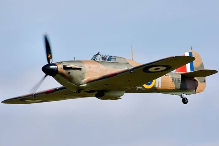 Hawker Hurricane Mk I P3717 in SW-P markings banking in flight over trees