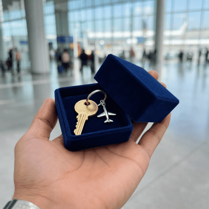 A new house key in a gift box turns a practical handover into the start of a new chapter.